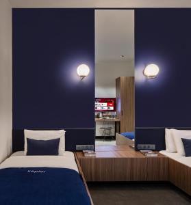 Postel nebo postele na pokoji v ubytování Kepler Club Sabiha Gökçen Airport - International Transit Area