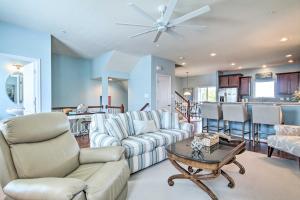 a living room with two couches and a table at Ocean City Home Boat Slip, Stunning Bay View in Ocean City