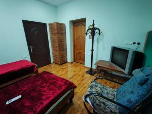 TV a/nebo společenská místnost v ubytování Guest House Nadejda
