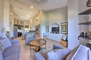 a living room with couches and a table at Resort-Style Cabo Getaway with Pools & Ocean Views in Cabo San Lucas