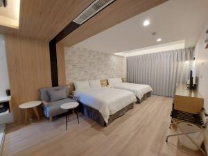 Una cama o camas en una habitación de 麗詩旅海景民宿