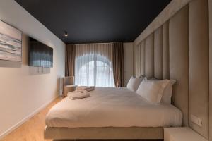 Posteľ alebo postele v izbe v ubytovaní Brera Luxury Apartment near Duomo With Wifi