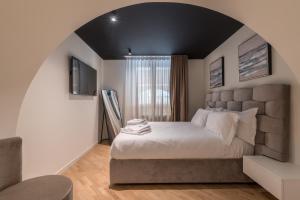 Posteľ alebo postele v izbe v ubytovaní Brera Luxury Apartment near Duomo With Wifi