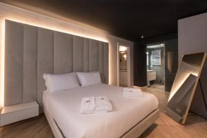 Posteľ alebo postele v izbe v ubytovaní Brera Luxury Apartment near Duomo With Wifi