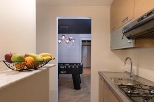 Kuchyňa alebo kuchynka v ubytovaní Brera Luxury Apartment near Duomo With Wifi
