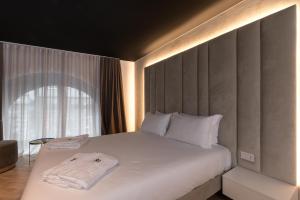 Posteľ alebo postele v izbe v ubytovaní Brera Luxury Apartment near Duomo With Wifi
