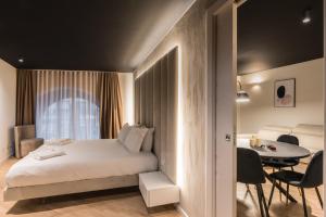 Posteľ alebo postele v izbe v ubytovaní Brera Luxury Apartment near Duomo With Wifi