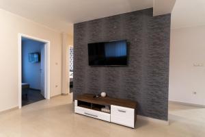 TV a/nebo společenská místnost v ubytování Thermal Lux Weninger Apartman