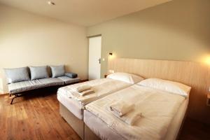 Apartmány Tatra客房内的一张或多张床位