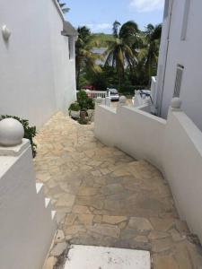 Balkón nebo terasa v ubytování 5 min from Orient Bay - perfect condo, Idolem résidence unité 6 - 57 Rue du Mont Vernon 1