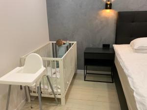 Ένα ή περισσότερα κρεβάτια σε δωμάτιο στο Tammsaare Luxury Apartment