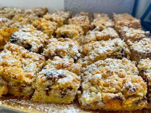 a bunch of food with powdered sugar on it at Frontemare Hotel Village & Ristorante in Rodi Garganico