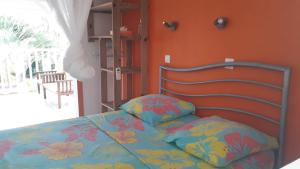 Letto o letti in una camera di ti case gwada location