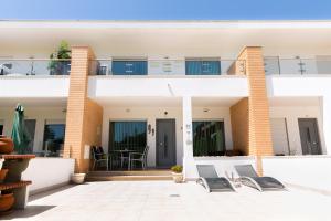 Μπαλκόνι ή βεράντα στο Sunny villa facing the swimming pool