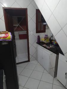 Kuchyň nebo kuchyňský kout v ubytování Cantinho da Nat Arraial