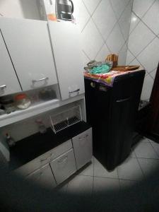 Kuchyň nebo kuchyňský kout v ubytování Cantinho da Nat Arraial