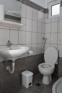Koupelna v ubytování Ronzi Apartments