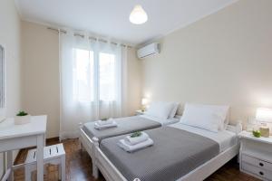 Postel nebo postele na pokoji v ubytování KS APARTMENT