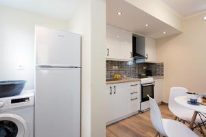 Kuchyň nebo kuchyňský kout v ubytování KS APARTMENT + 18 fotografií