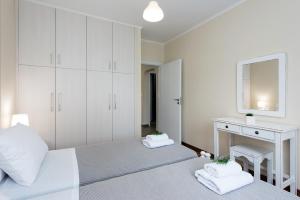 Postel nebo postele na pokoji v ubytování KS APARTMENT
