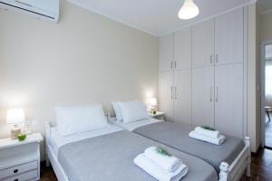 Postel nebo postele na pokoji v ubytování KS APARTMENT
