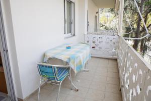 Postel nebo postele na pokoji v ubytování Ronzi Apartments