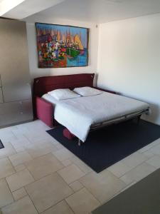 Кровать или кровати в номере Bel appartement spacieux et confortable idéalement situé