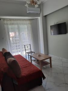 TV a/nebo společenská místnost v ubytování Kalamata COSY APARTMENT 2
