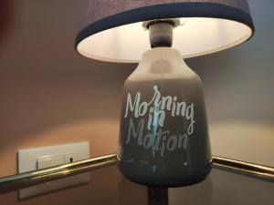 a lamp with a no drinking up nation sign on it at Stanza Lillina in San Benedetto del Tronto