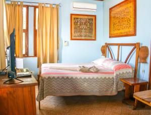 Voodi või voodid majutusasutuse Hotel Boruca Tamarindo toas
