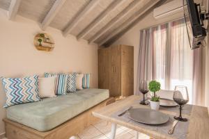 Postel nebo postele na pokoji v ubytování Koukos Loft Apartments