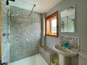 a bathroom with a sink and a shower at Failte Mhor in Fort William