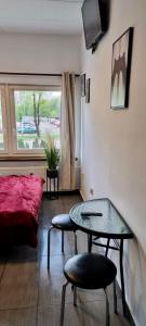 Posteľ alebo postele v izbe v ubytovaní Aparthotel Superjednostka Katowice