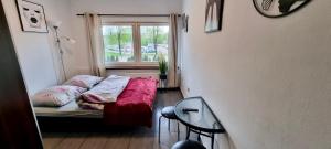Posteľ alebo postele v izbe v ubytovaní Aparthotel Superjednostka Katowice