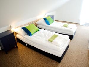 Postel nebo postele na pokoji v ubytování Apartmány Lhota