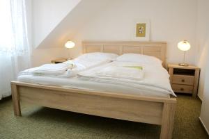 Postel nebo postele na pokoji v ubytování Apartmány Lhota