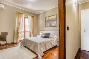 Кровать или кровати в номере Hotel Villa De Santis
