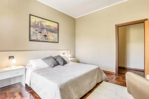 Łóżko lub łóżka w pokoju w obiekcie Hotel Villa De Santis