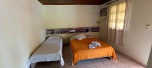 Postel nebo postele na pokoji v ubytování Hotel Recanto Do Sol + 26 fotografií