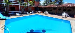 Bazén v ubytování Hotel Recanto Do Sol nebo v jeho okolí