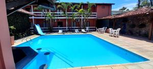 Bazén v ubytování Hotel Recanto Do Sol nebo v jeho okolí