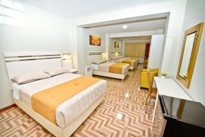 Postel nebo postele na pokoji v ubytování Mercé Hotel