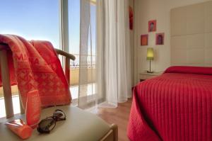 Postel nebo postele na pokoji v ubytování Hotel Telenia