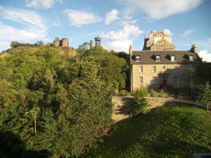 a castle on top of a hill with a yard at CENTRAL Calton Hill What a view in Edinburgh