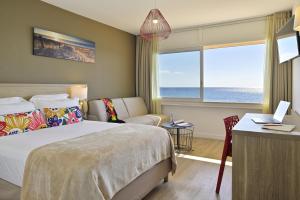 Postel nebo postele na pokoji v ubytování Hotel Stella Di Mare + 31 fotografií