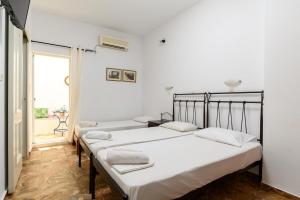 Llit o llits en una habitació de Ios Fantasy