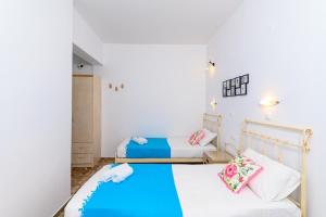 Llit o llits en una habitació de Ios Fantasy