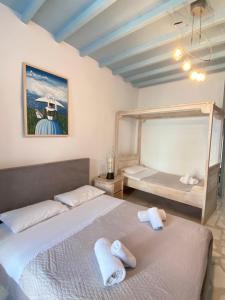 Posteľ alebo postele v izbe v ubytovaní Villa Viento of Mykonos + 27 fotografií