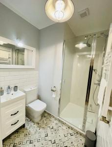 Kúpeľňa v ubytovaní Apartamenty - Dom w Ogrodzie Anny
