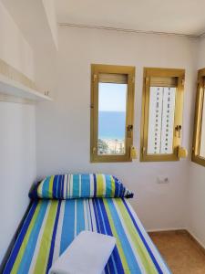 Postel nebo postele na pokoji v ubytování GERONA sea view apartments